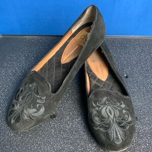 Black faux suede slip ins DV